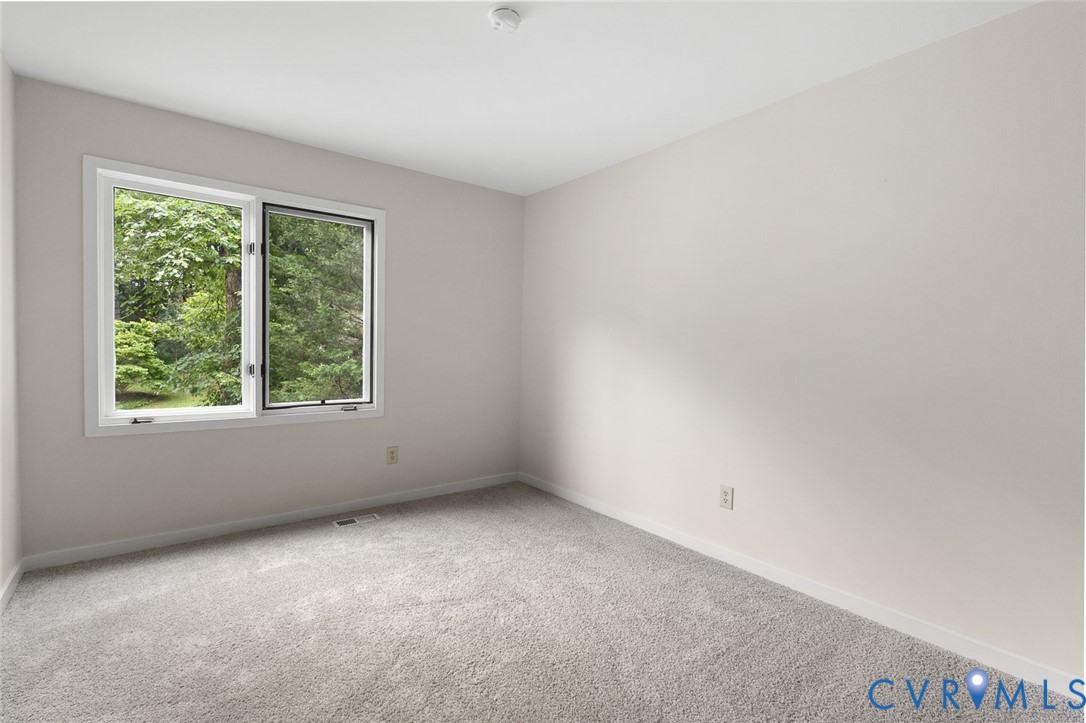 12916 Copperas Lane Henrico, VA 23233 - Photo 16 of 26 an empty room with a window