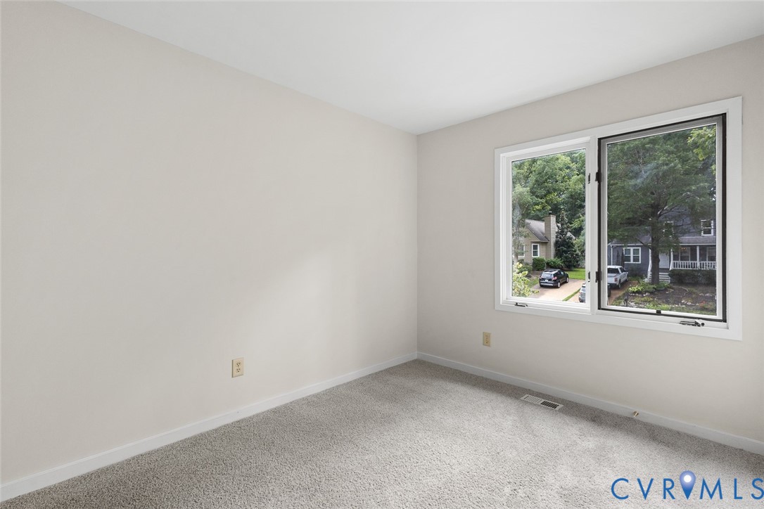 12916 Copperas Lane Henrico, VA 23233 - Photo 19 of 26 an empty room with a window