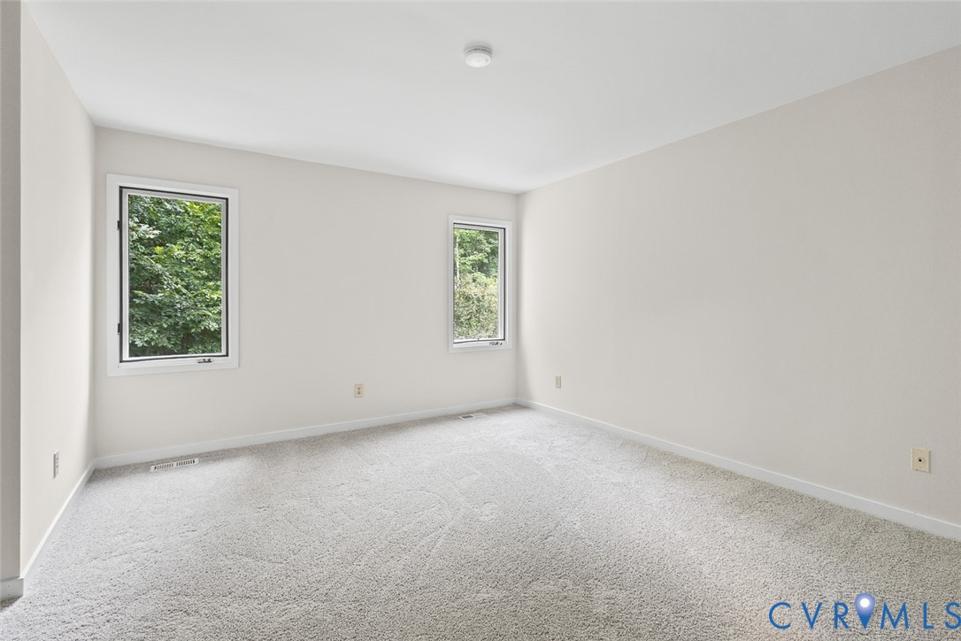 12916 Copperas Lane Henrico, VA 23233 - Photo 20 of 26 an empty room with windows