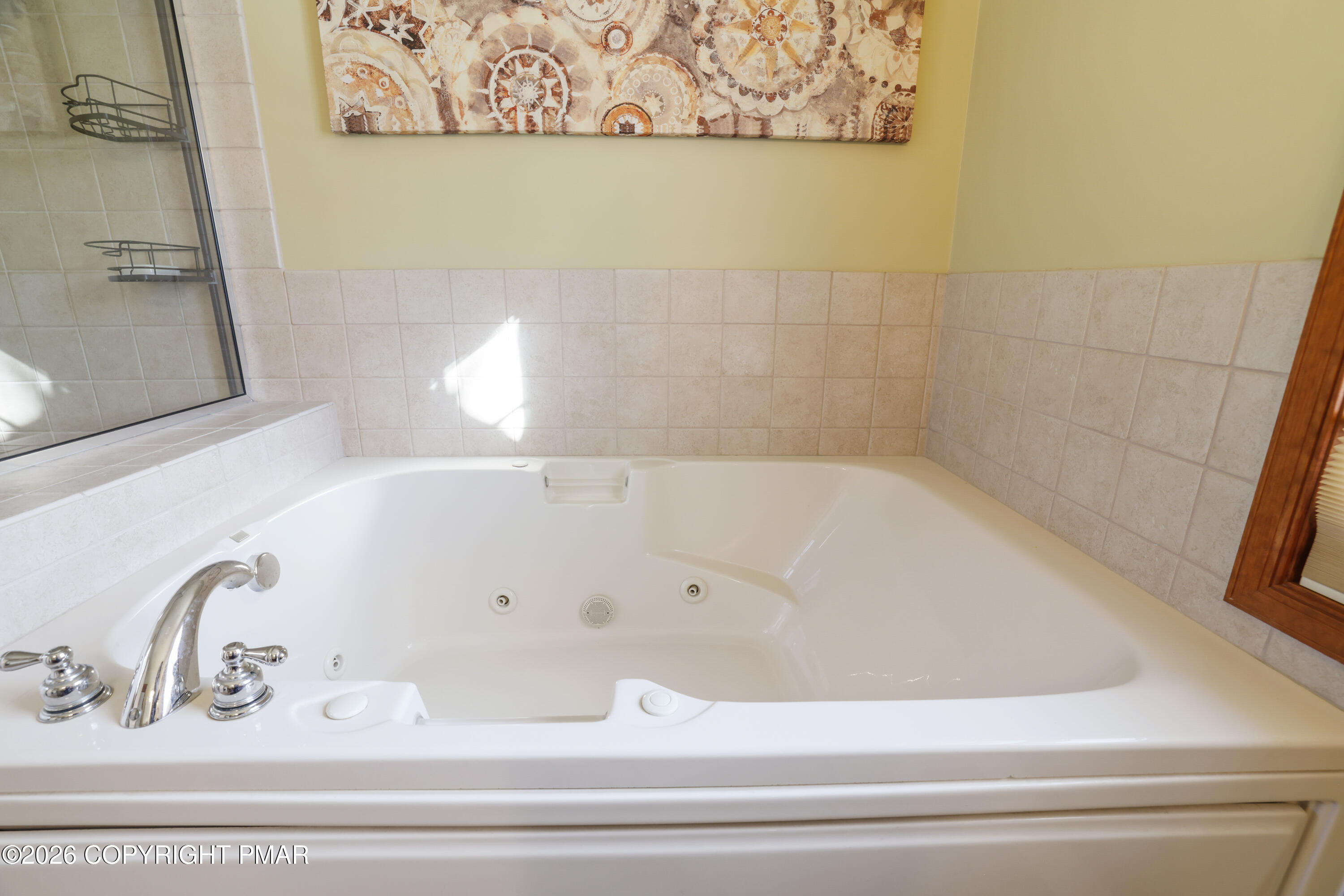 3220 Cherry Ridge Road Bushkill, PA 18324 - Photo 18 of 47 a bathroom with a bathtub