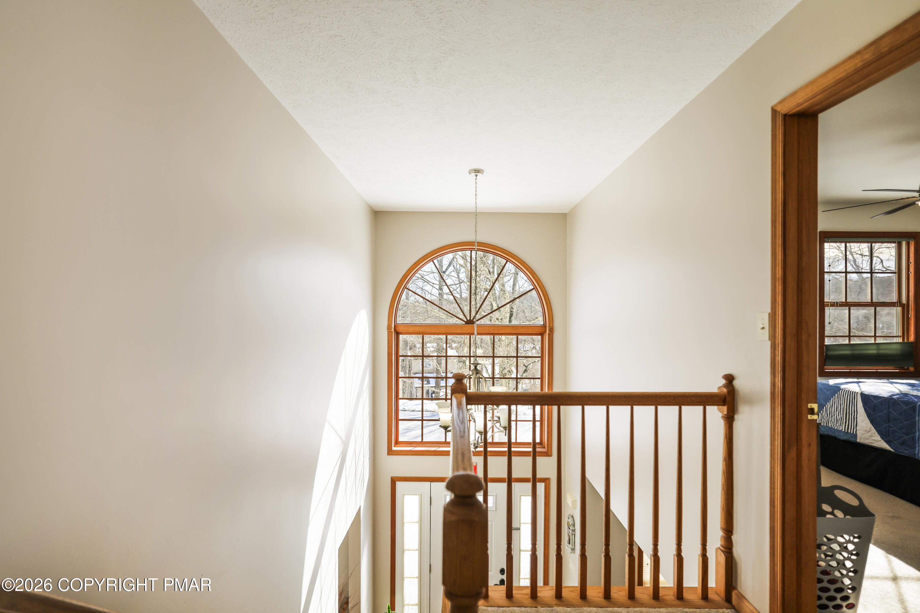 3220 Cherry Ridge Road Bushkill, PA 18324 - Photo 22 of 47 an empty room with windows and outdoor view
