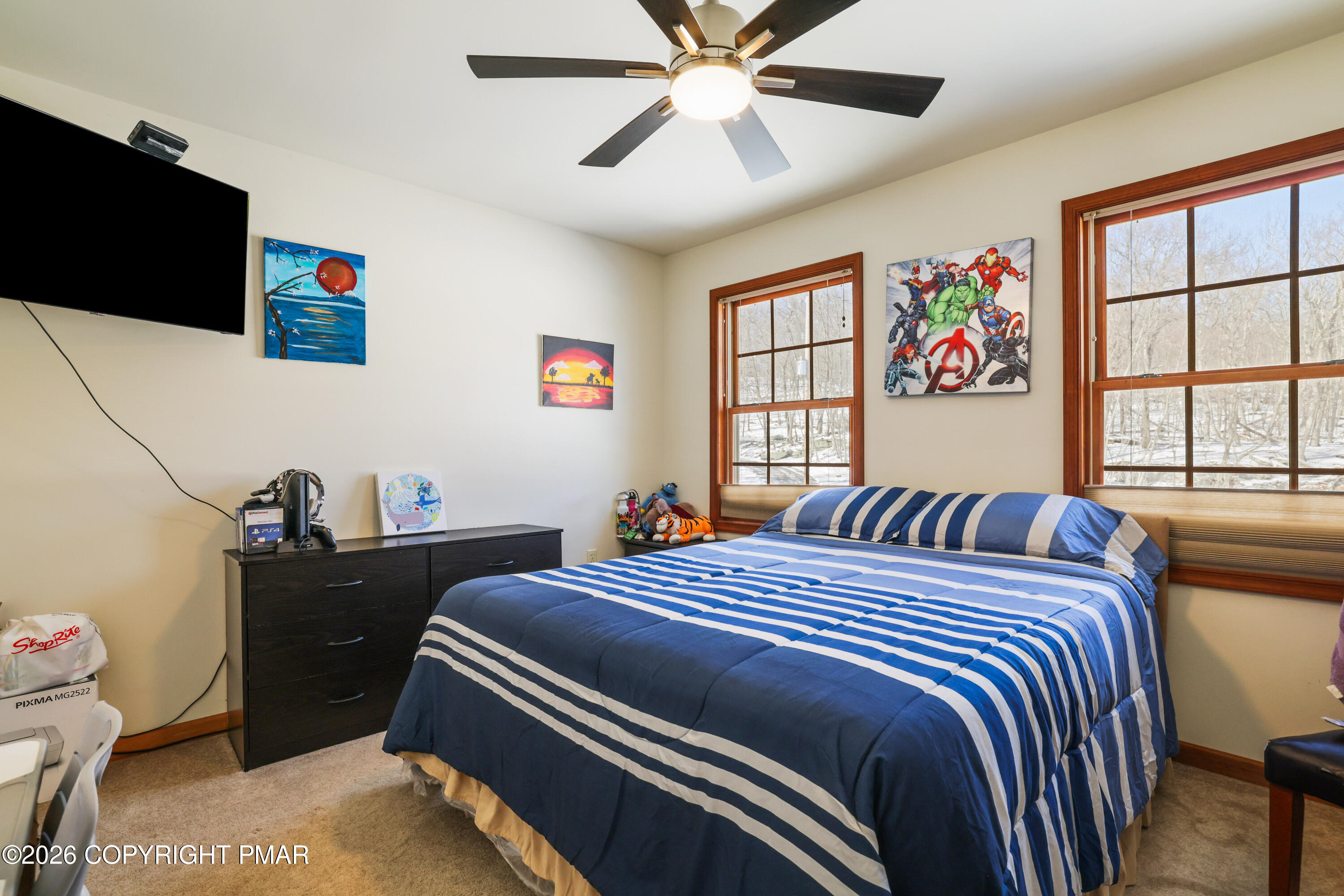 3220 Cherry Ridge Road Bushkill, PA 18324 - Photo 23 of 47 a bedroom with a bed and a window