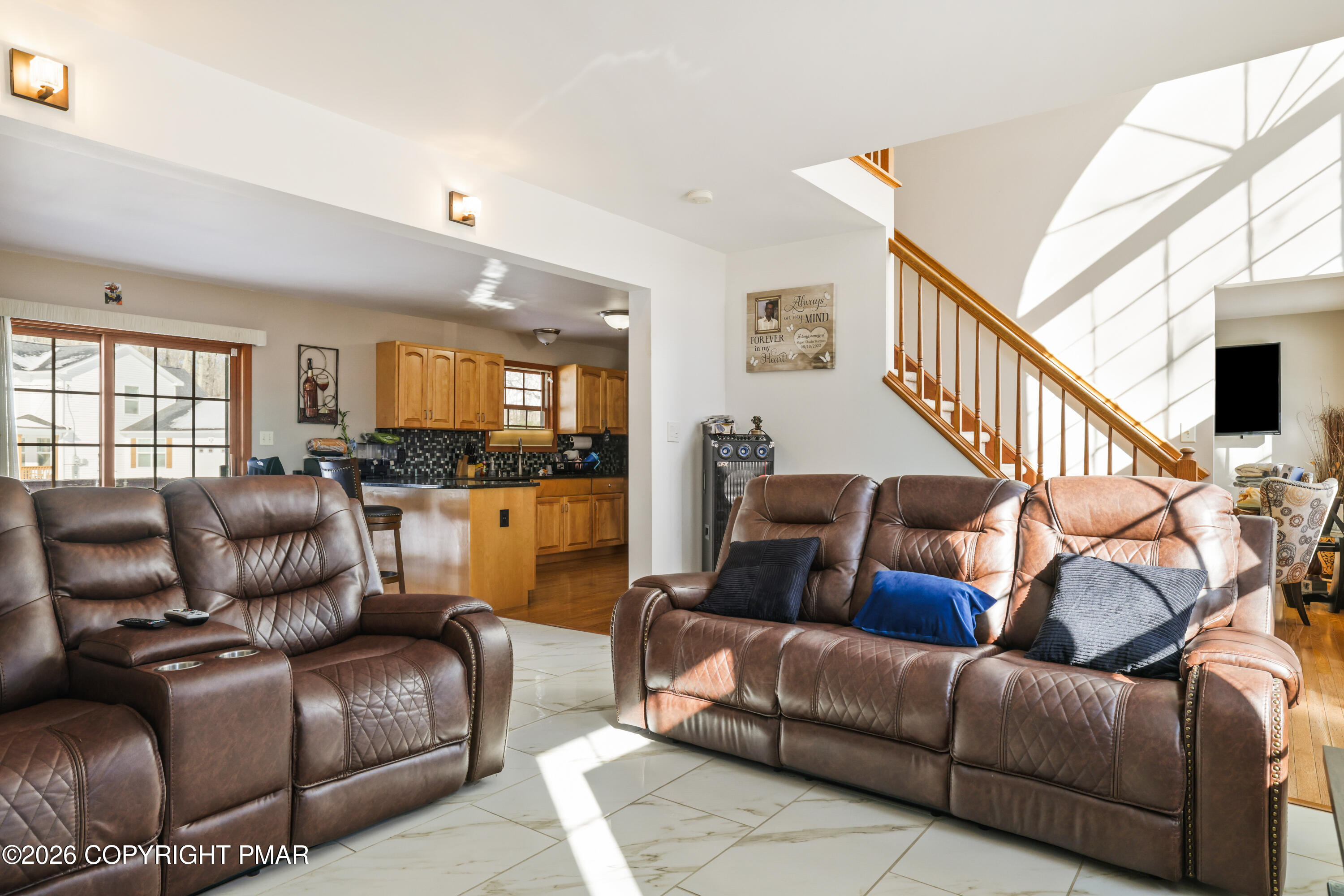 3220 Cherry Ridge Road Bushkill, PA 18324 - Photo 30 of 47 a living room with furniture and a flat screen tv