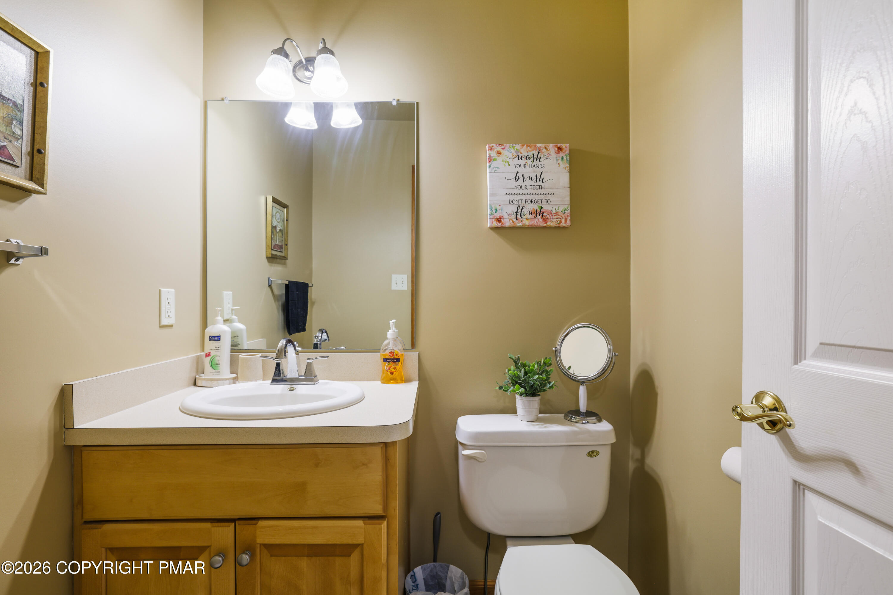 3220 Cherry Ridge Road Bushkill, PA 18324 - Photo 35 of 47 a bathroom with a sink and a mirror