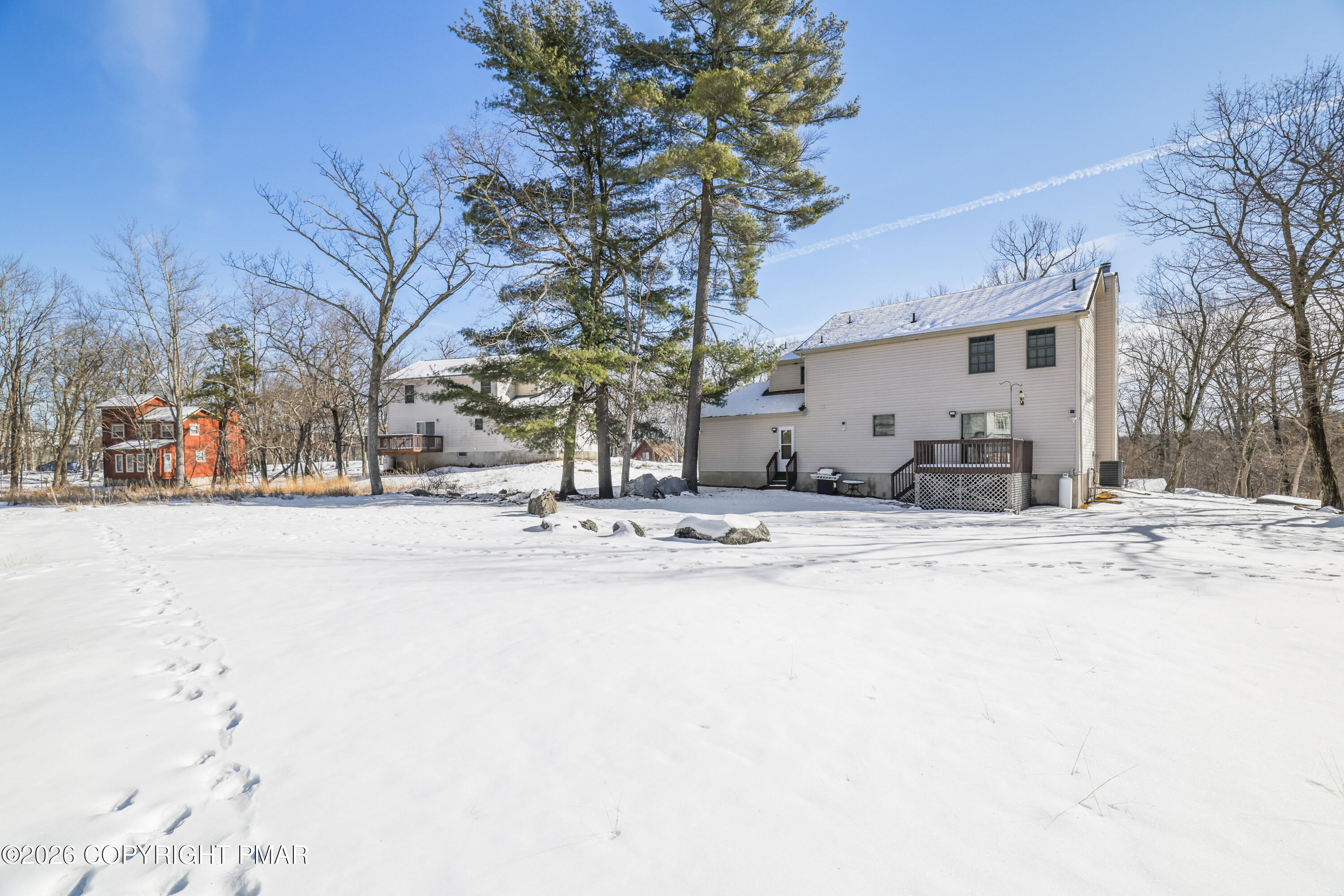 3220 Cherry Ridge Road Bushkill, PA 18324 - Photo 39 of 47 a view of white house with a snow on the road