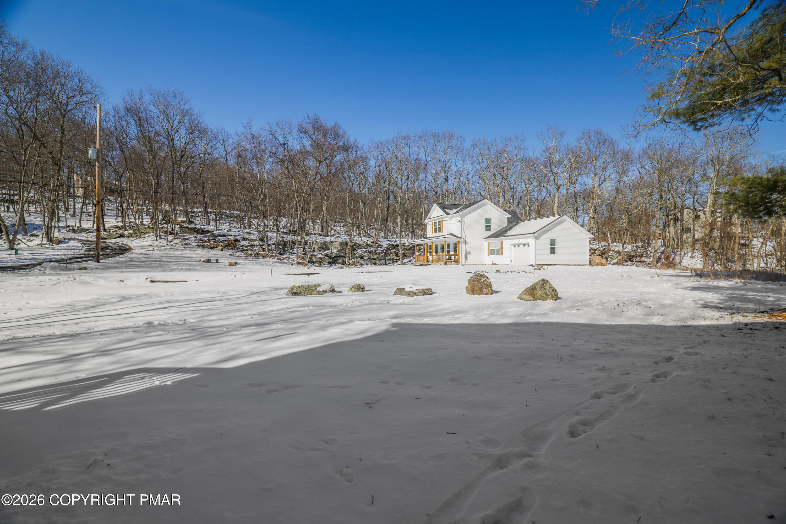 3220 Cherry Ridge Road Bushkill, PA 18324 - Photo 40 of 47 a view of white house with a snow on the road
