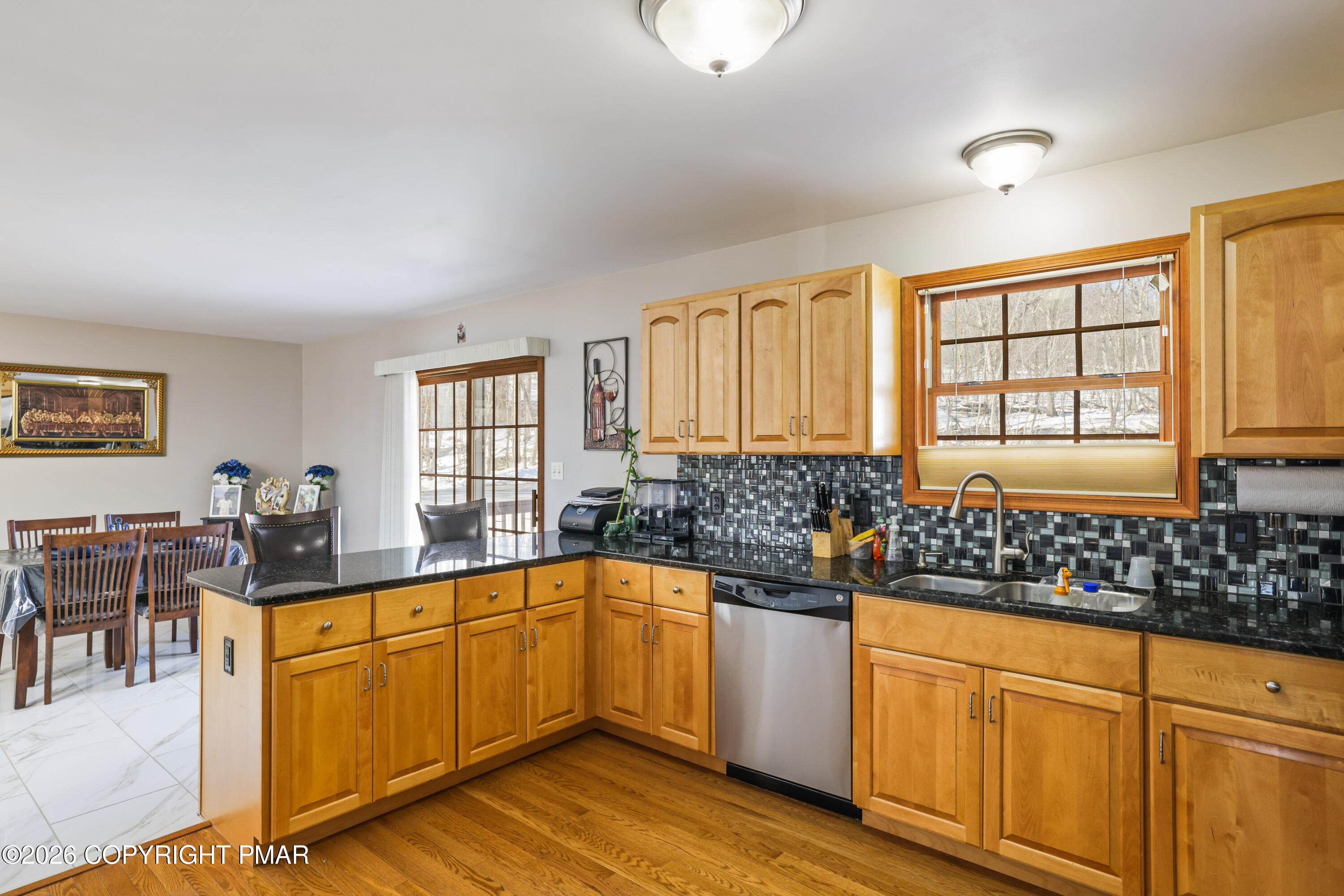 3220 Cherry Ridge Road Bushkill, PA 18324 - Photo 4 of 47 a kitchen with sink cabinets and window