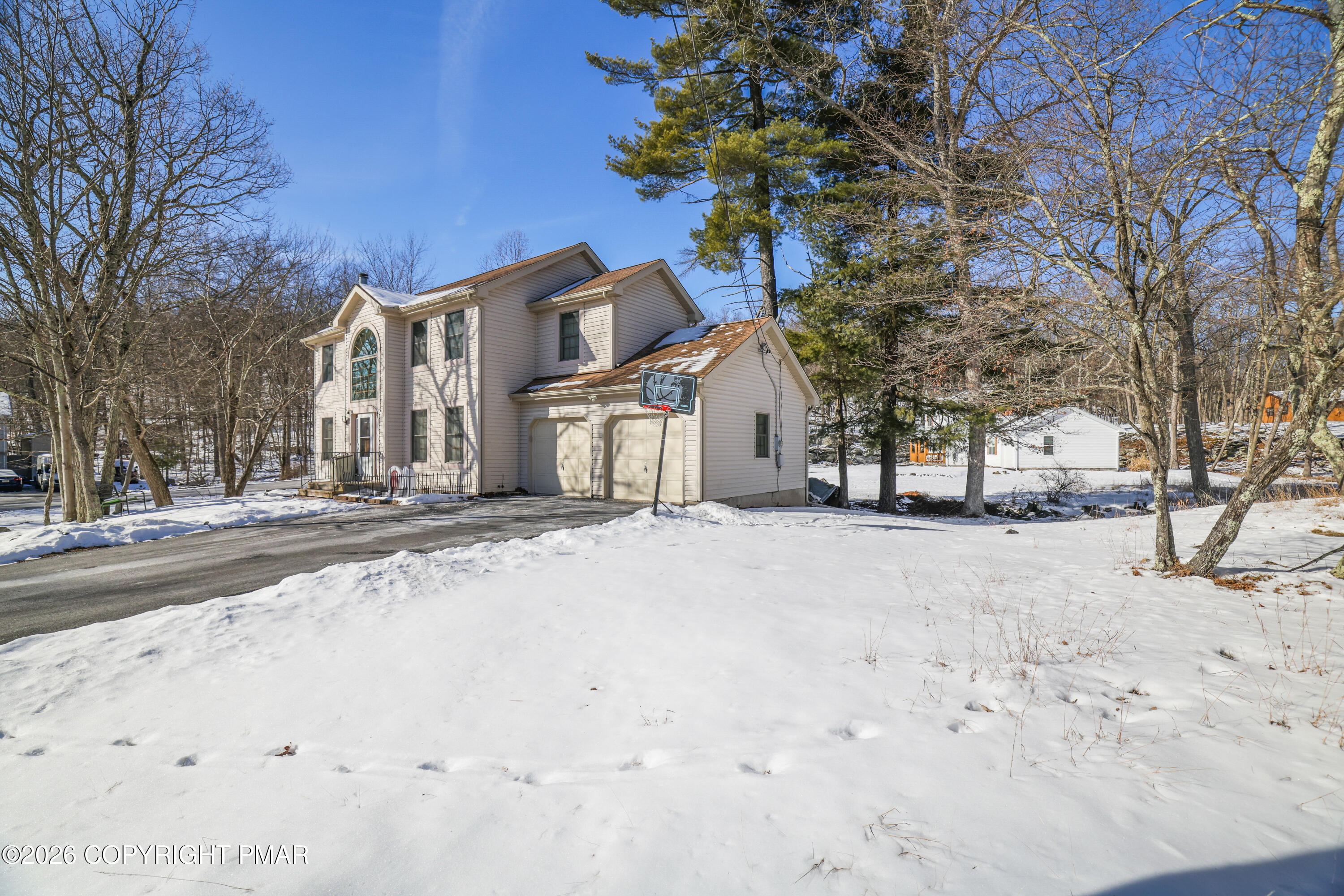 3220 Cherry Ridge Road Bushkill, PA 18324 - Photo 42 of 47 a view of a house with a snow on the road