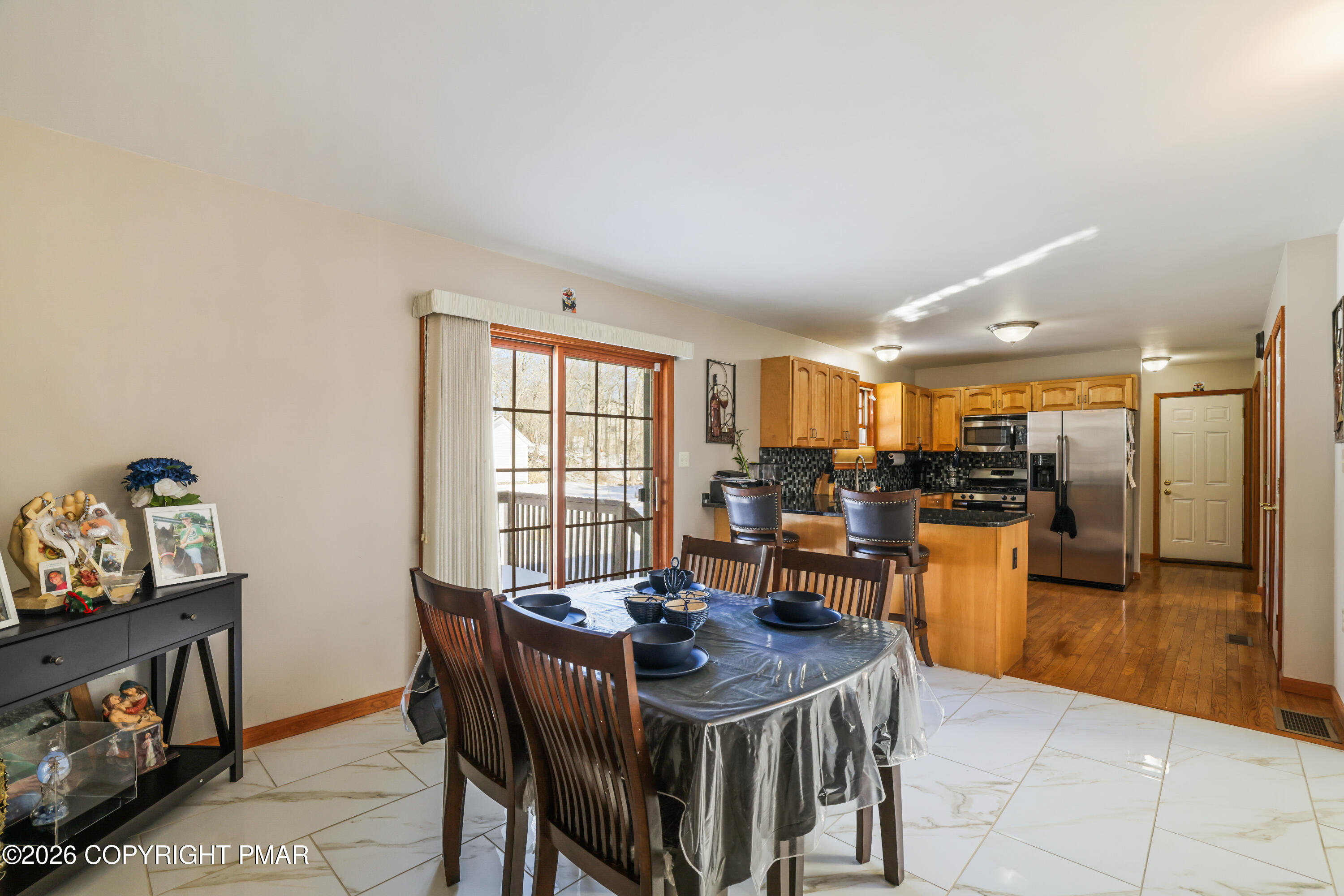 3220 Cherry Ridge Road Bushkill, PA 18324 - Photo 9 of 47 a view of a dining room with furniture