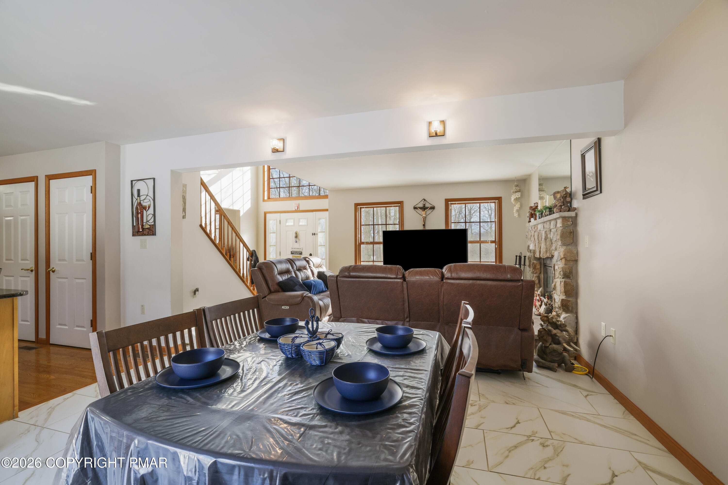 3220 Cherry Ridge Road Bushkill, PA 18324 - Photo 10 of 47 a living room with furniture and a flat screen tv