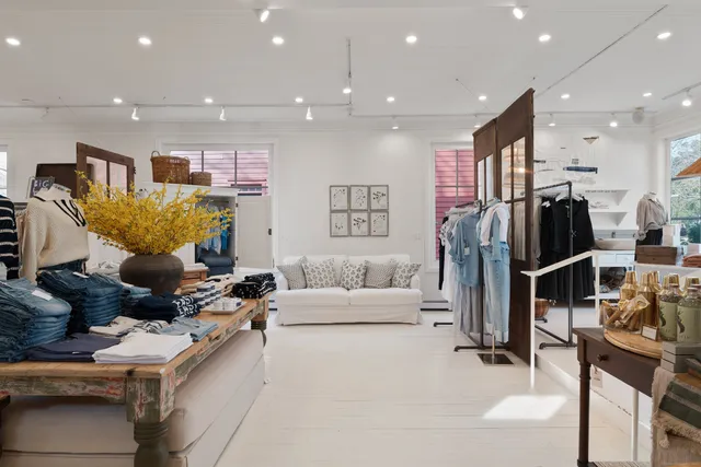 a kitchen with stainless steel appliances kitchen island granite countertop lots of counter top space