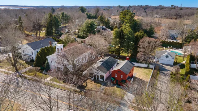 an aerial view of a house with outdoor space