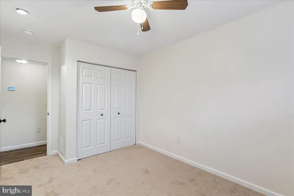 a view of a livingroom with wooden floor
