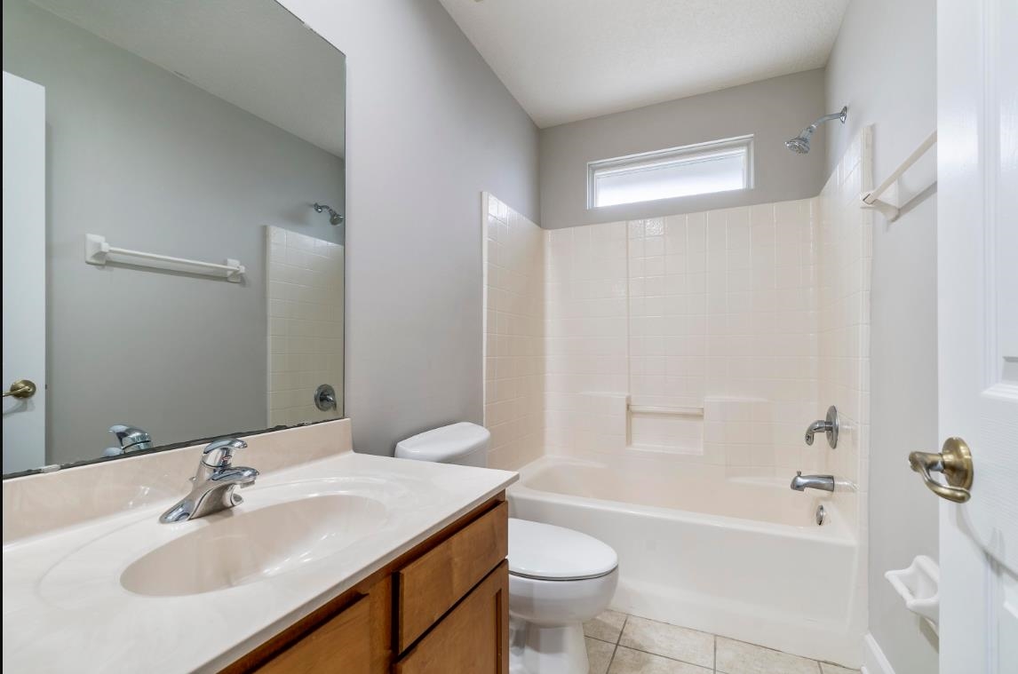206 2nd Street St. Augustine, FL 32084 - Photo 22 of 32 a bathroom with a sink toilet and bathtub