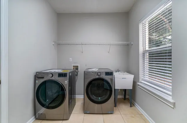 a utility room with dryer and washer