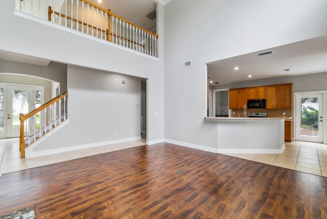 206 2nd Street St. Augustine, FL 32084 - Photo 5 of 32 a view of an entryway with wooden floor