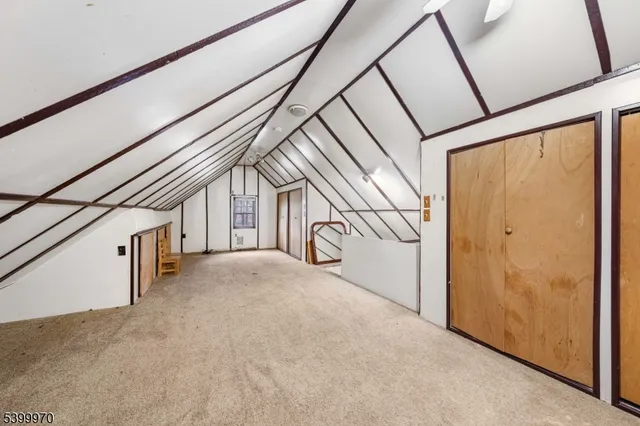 a view of a hallway with staircase