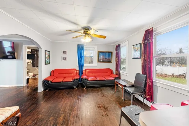 a bedroom with bed and a window