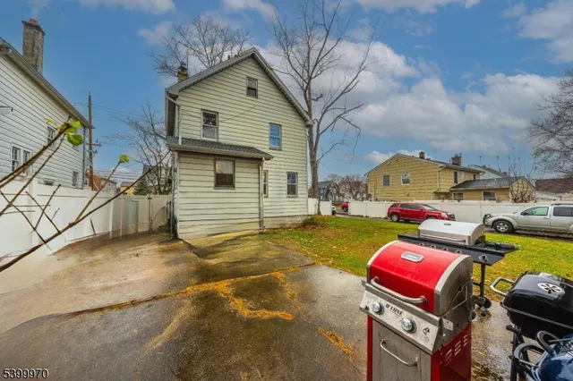 a view of a back yard of the house