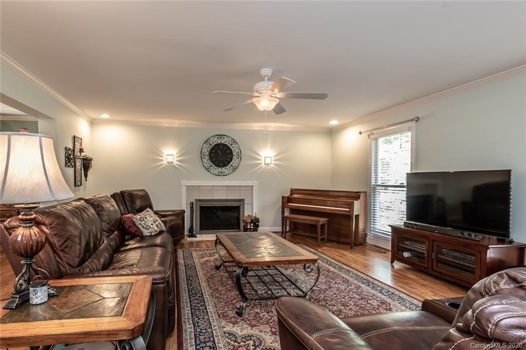 3217 Weidner Road Newton, NC 28658 - Photo 22 of 43 a living room with furniture and a flat screen tv