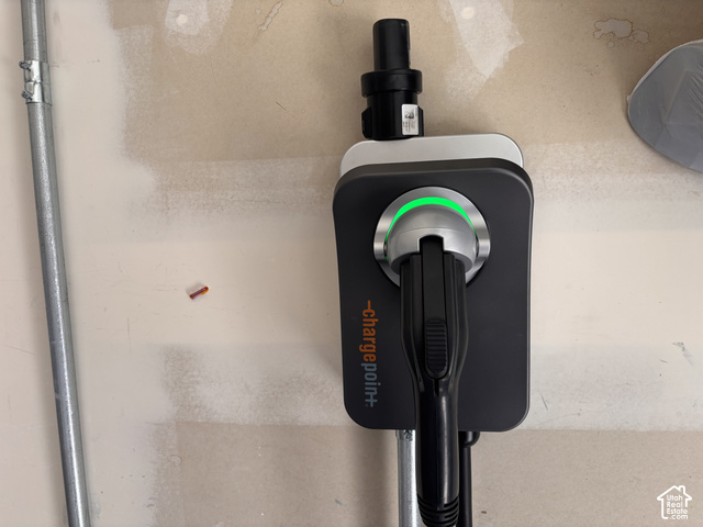 4476 North Crest Ridge Road Lehi, UT 84048 - Photo 56 of 77 Wall-mounted electric vehicle charging station with integrated plug and cord