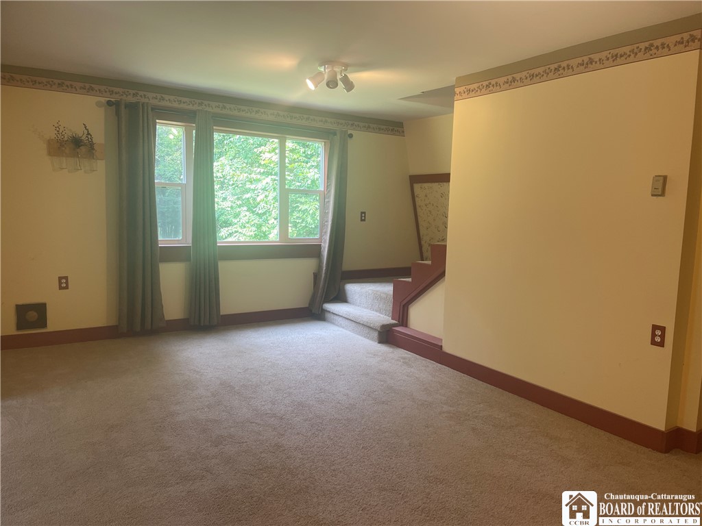 9924 Bailey Hill Road Mina, NY 14781 - Photo 28 of 42 Family room with second set of stairs