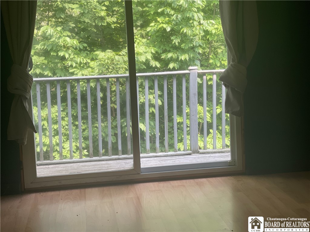 9924 Bailey Hill Road Mina, NY 14781 - Photo 35 of 42 Back bedroom with deck off