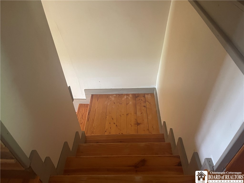 9924 Bailey Hill Road Mina, NY 14781 - Photo 38 of 42 Stairs down from bedrooms - empty into living room