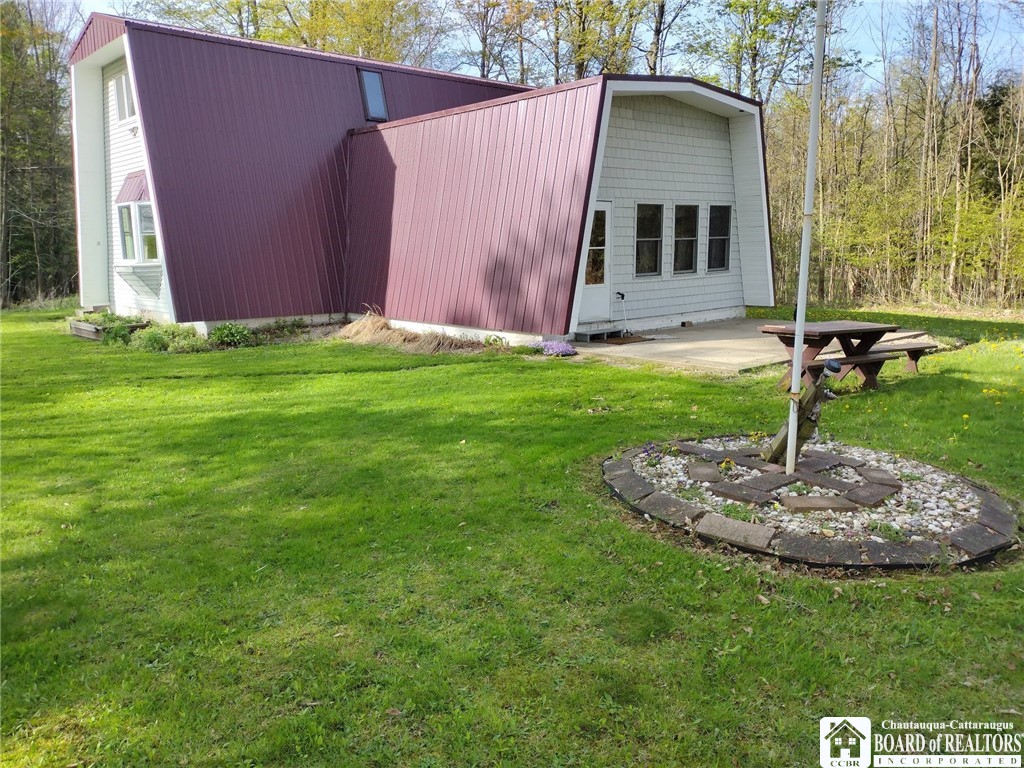 9924 Bailey Hill Road Mina, NY 14781 - Photo 5 of 42 Kitchen end of house with patio