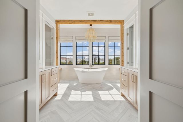 a floor to ceiling window with a couch