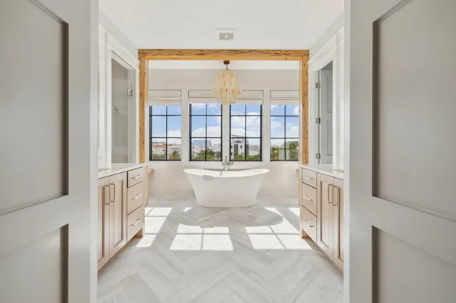 a floor to ceiling window with a couch