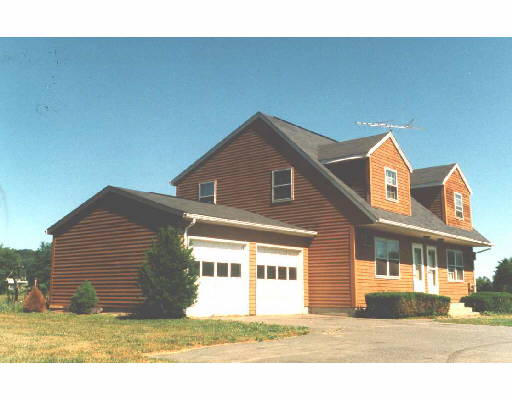 505507 Sunderland Road Amherst, MA 01002 - Photo 1 of 1 a front view of a house with a yard
