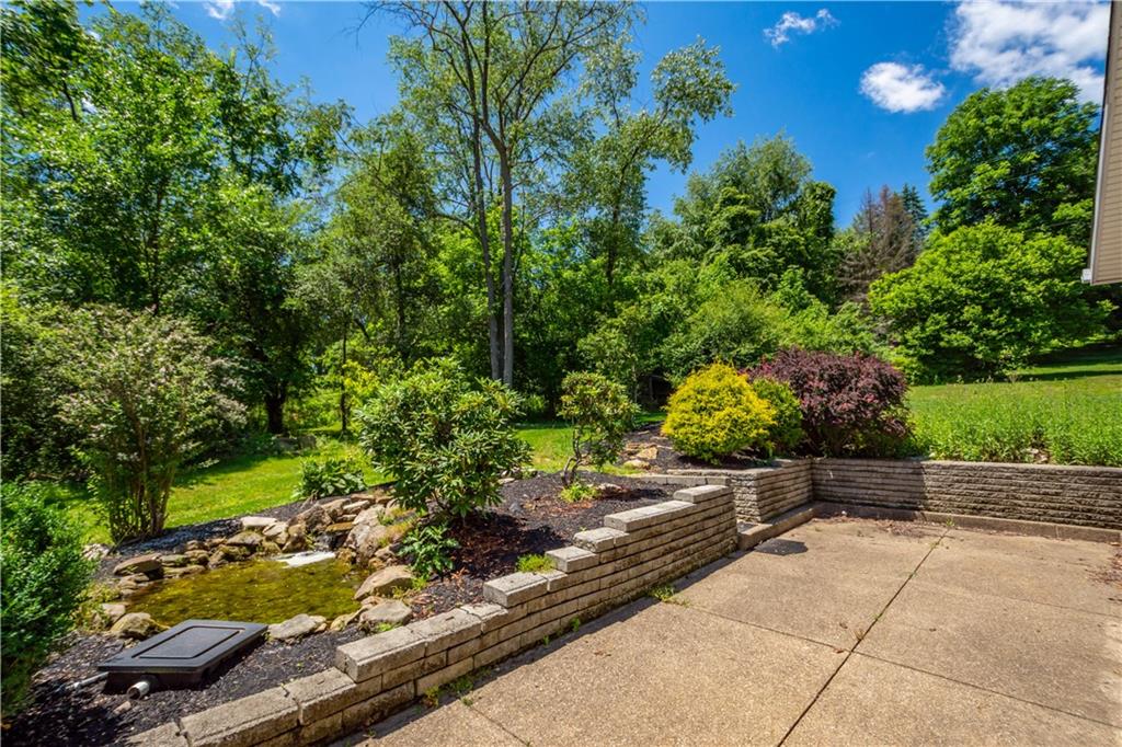 1147 Thomas Eighty Four Road Eighty Four, PA 15330 - Photo 2 of 24 a view of a garden with potted plants