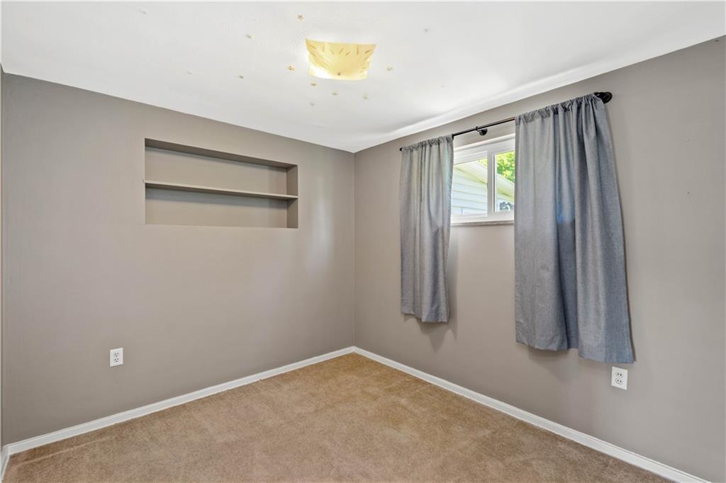 1147 Thomas Eighty Four Road Eighty Four, PA 15330 - Photo 14 of 24 an empty room with windows