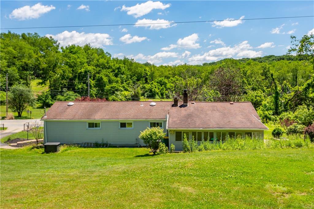 1147 Thomas Eighty Four Road Eighty Four, PA 15330 - Photo 19 of 24 a view of a house with a garden