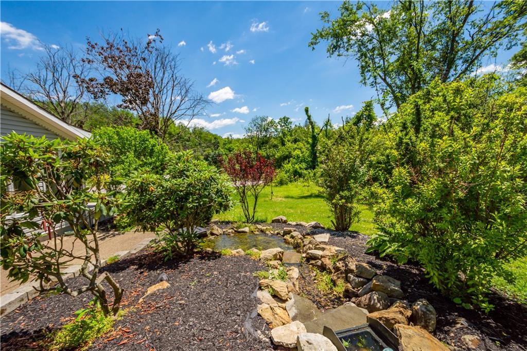 1147 Thomas Eighty Four Road Eighty Four, PA 15330 - Photo 3 of 24 a view of a tree with a yard