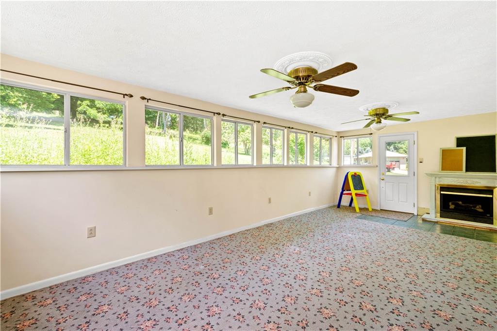 1147 Thomas Eighty Four Road Eighty Four, PA 15330 - Photo 8 of 24 wooden floor in an empty room with a window