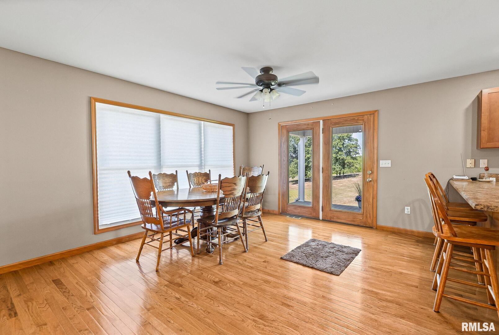 520 Deerfield Road Walnut Hill, IL 62893 - Photo 39 of 85 a view of a dining room with furniture window and wooden floor