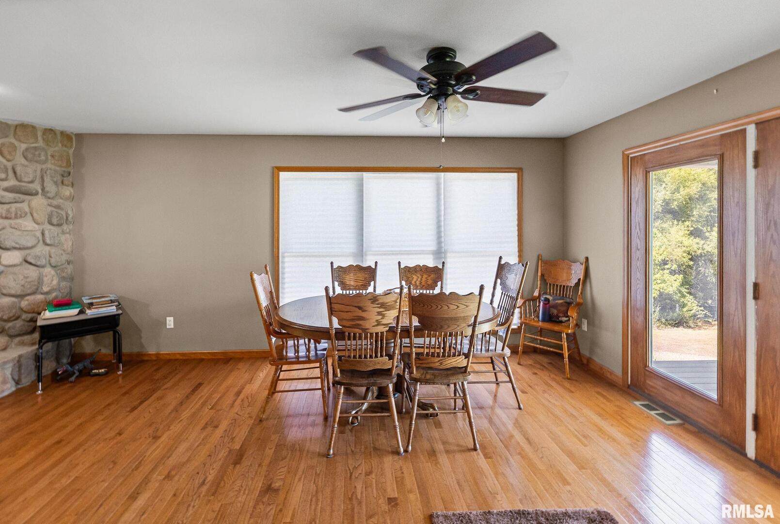 520 Deerfield Road Walnut Hill, IL 62893 - Photo 42 of 85 a view of a dining room with furniture window and wooden floor