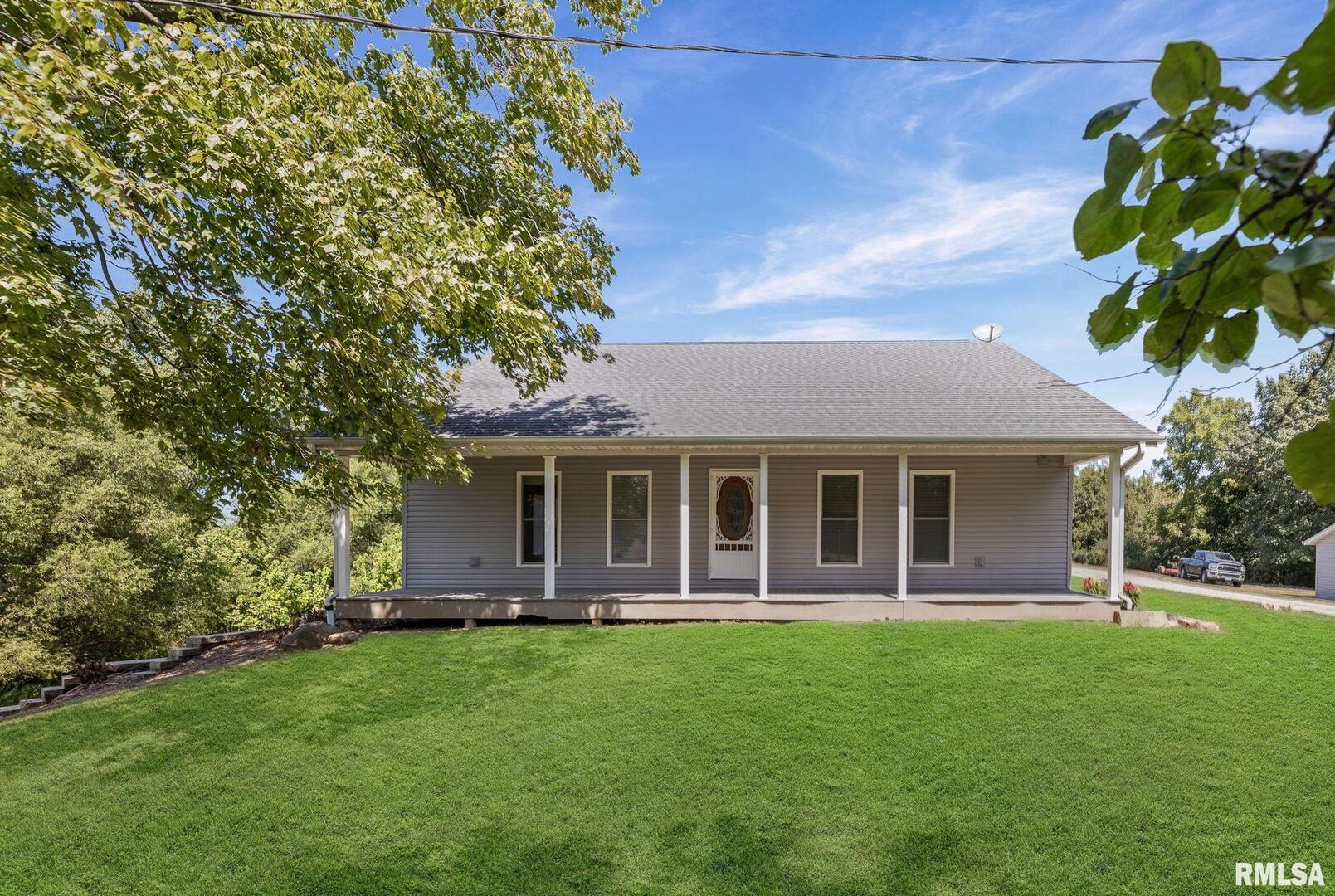 520 Deerfield Road Walnut Hill, IL 62893 - Photo 6 of 85 a view of an house with backyard space and garden