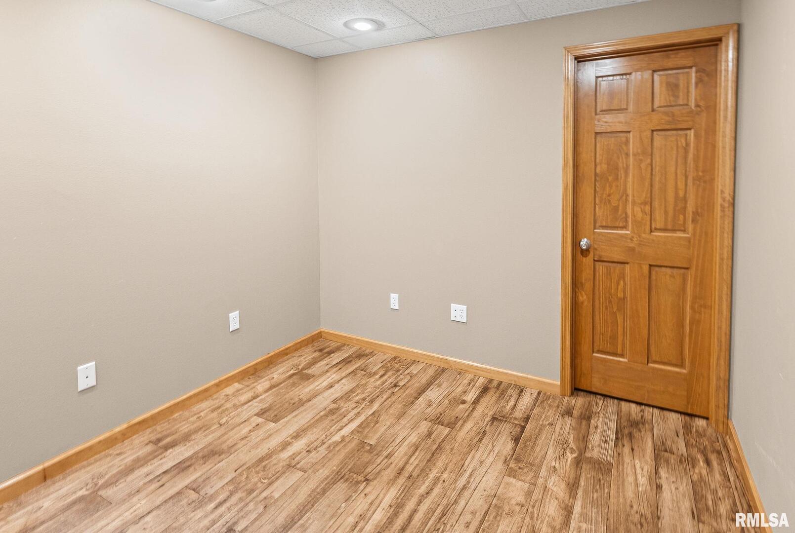 520 Deerfield Road Walnut Hill, IL 62893 - Photo 65 of 85 an empty room with wooden floor and closet area