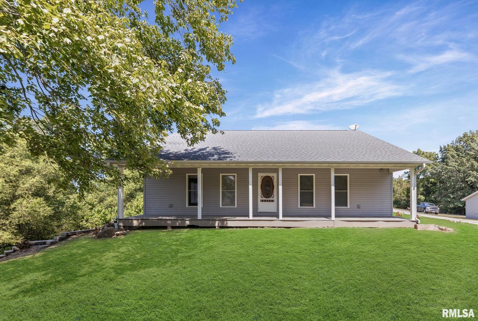 520 Deerfield Road Walnut Hill, IL 62893 - Photo 9 of 85 a view of an house with backyard space and garden