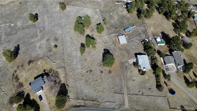 an aerial view of waterside residential houses with outdoor space