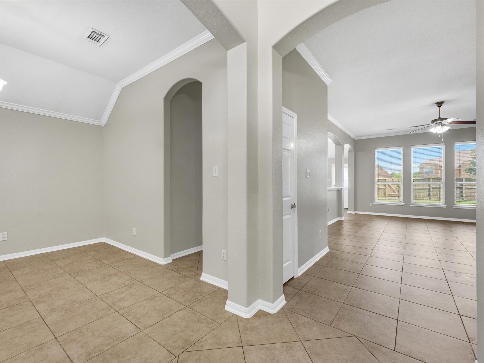 5122 Dripping Spring Avenue Baytown, TX 77523 - Photo 8 of 33 Front entry, dining on left, open spaces and tall ceilings