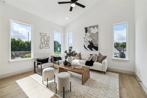 a living room with furniture and a window