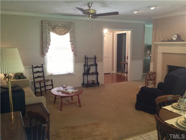 859 Old Salem Road Roxboro, NC 27573 - Photo 14 of 25 a living room with furniture and a window