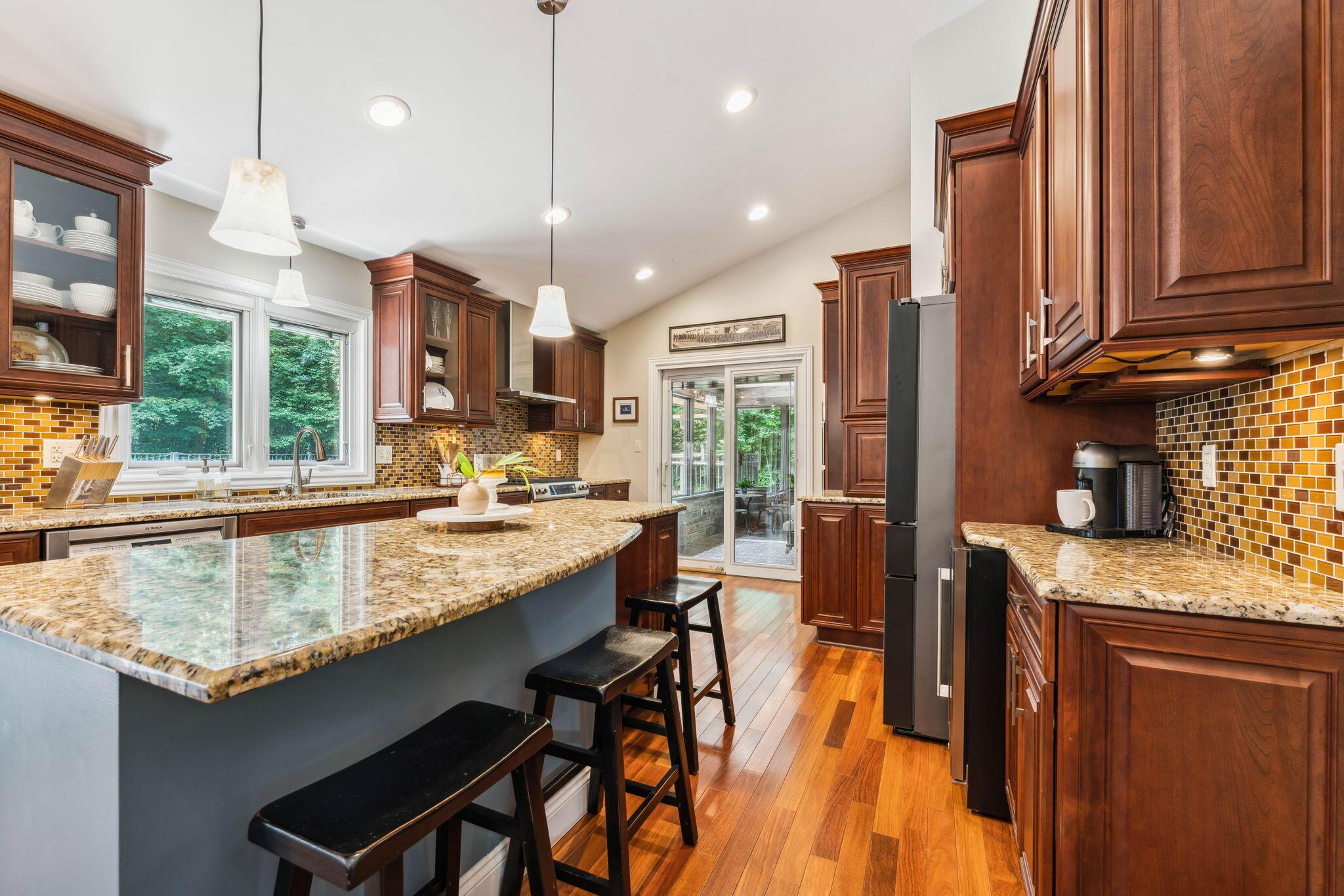 2423 Carriage Road Powell, OH 43065 - Photo 27 of 100 Additional seating at the kitchen island!