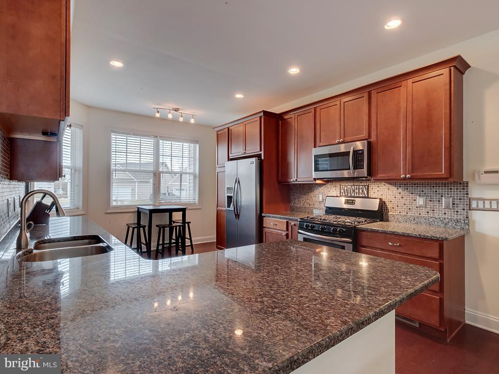 213 Sassafras Lane Milton, DE 19968 - Photo 6 of 36 L-shape upgraded counters