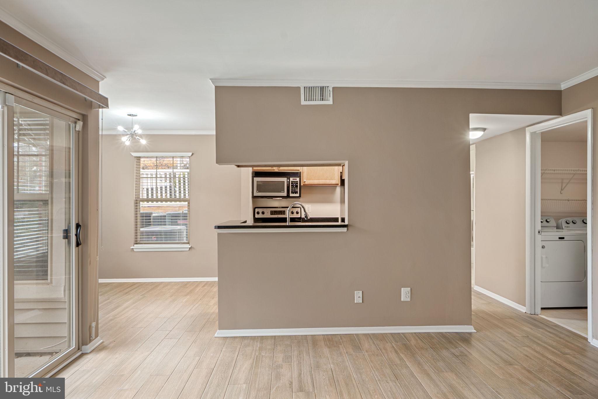 1723 Ascot Way, Unit A Reston, VA 20190 - Photo 8 of 32 Nice flow between spaces