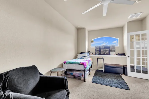 a living room with furniture and a couch